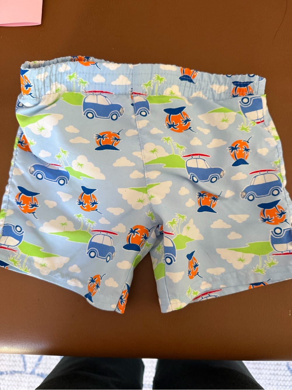 i play. Light Blue Swim Shorts with Orange and Navy Island Print